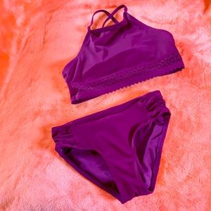 Justice 2 piece bathing suit. Solid color.